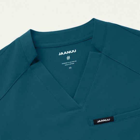 Jaanuu Helia Notched V-Neck Scrub Top Caribbean blue size small - Picture 2 of 3